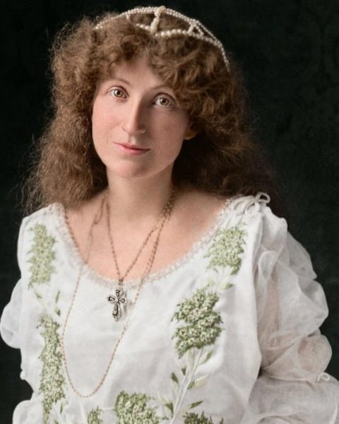 After: the same portrait restored with natural color