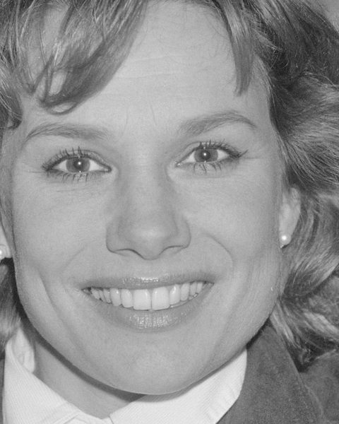 Before: black-and-white portrait of a smiling young woman