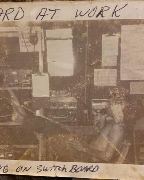 A faded, damaged old photo