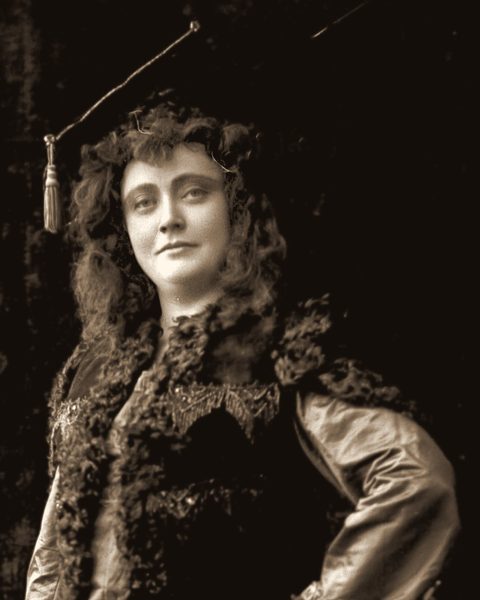 After: the same portrait restored with warm sepia tones