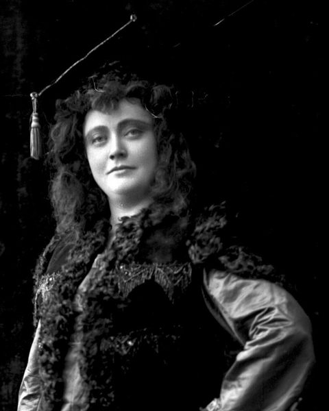 Before: faded 1903 costume portrait